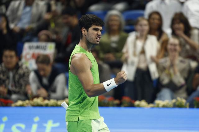 Spain's Carlos Alcaraz reacts during their men’s singles quarterfinal match against Russia's Karen Khachanov at the Qatar Open tennis tournament in Doha on February 19, 2026. (Photo by Karim JAAFAR / AFP)