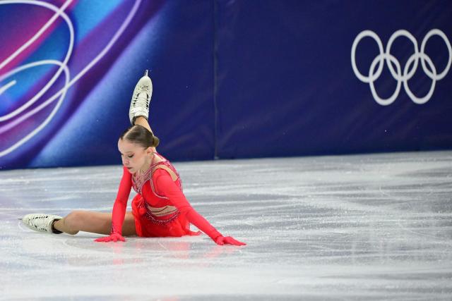 Israel's Mariia Seniuk falls while competing in the figure skating women's single free skating final during the Milano Cortina 2026 Winter Olympic Games at Milano Ice Skating Arena in Milan on February 19, 2026. (Photo by Piero CRUCIATTI / AFP)