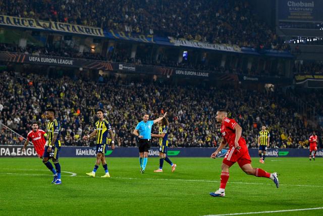 Nottingham Forest's Brazilian defender #05 Murillo (R) celebrates after scoring Forest's first goal during the UEFA Europa League - knockout round play-off first leg - football match between Fenerbahce SK and Nottingham Forest FC at the Sukru Saracoglu Stadium in Istanbul on February 19, 2026. (Photo by Yasin AKGUL / AFP)