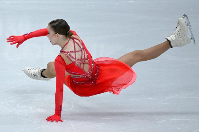 Israel's Mariia Seniuk falls while competing in the figure skating women's single free skating final during the Milano Cortina 2026 Winter Olympic Games at Milano Ice Skating Arena in Milan on February 19, 2026. (Photo by WANG Zhao / AFP)