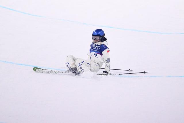 China's Gu Ailing Eileen competes in the freestyle skiing women's freeski halfpipe qualification run 1 during the Milano Cortina 2026 Winter Olympic Games at Livigno Snow Park, in Livigno (Valtellina), on February 19, 2026. (Photo by Kirill KUDRYAVTSEV / AFP)