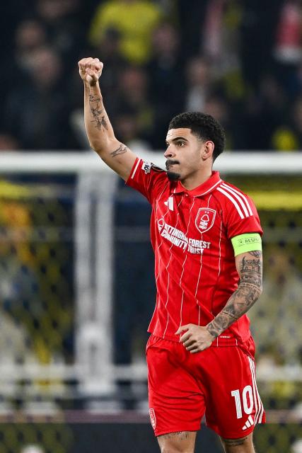 Nottingham Forest's English midfielder #10 Morgan Gibbs-White celebrates after scoring Forest's third goal during the UEFA Europa League - knockout round play-off first leg - football match between Fenerbahce SK and Nottingham Forest FC at the Sukru Saracoglu Stadium in Istanbul on February 19, 2026. (Photo by Yasin AKGUL / AFP)