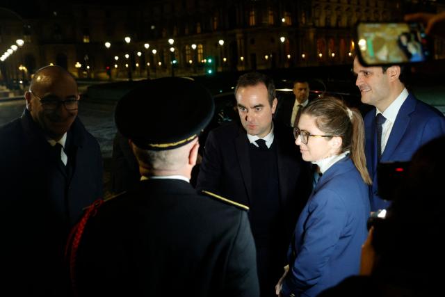 France's Prime Minister Sebastien Lecornu (C) flnaked by President of the Representative Council of Jewish Institutions in France (CRIF) Yonathan Arfi (R), France's Interior Minister Laurent Nunez (L) and France's junior Minister in charge of equality Aurore Berge (2nd R), arrives to attend the annual dinner of the Representative Council of Jewish Institutions of France (CRIF - Conseil Representatif des Institutions juives de France) at the Louvre Carrousel in Paris on February 19, 2026. (Photo by GEOFFROY VAN DER HASSELT / AFP)