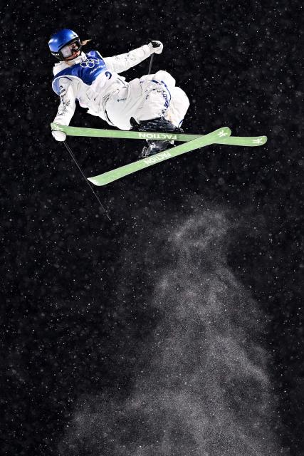 China's Gu Ailing Eileen competes in the freestyle skiing women's freeski halfpipe qualification run 2 during the Milano Cortina 2026 Winter Olympic Games at Livigno Snow Park, in Livigno (Valtellina), on February 19, 2026. (Photo by Kirill KUDRYAVTSEV / AFP)