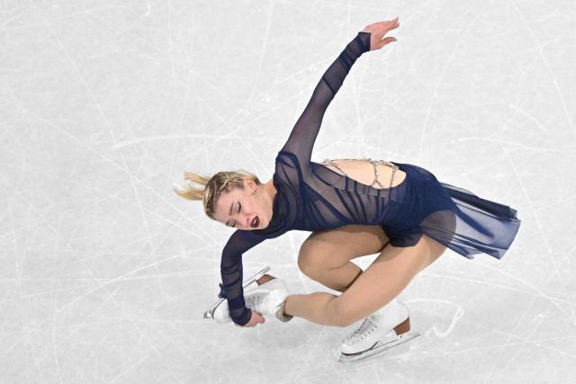 USA's Amber Glenn competes in the figure skating women's single free skating final during the Milano Cortina 2026 Winter Olympic Games at Milano Ice Skating Arena in Milan on February 19, 2026. (Photo by Antonin THUILLIER / AFP)