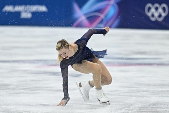 USA's Amber Glenn stumbles as she competes in the figure skating women's single free skating final during the Milano Cortina 2026 Winter Olympic Games at Milano Ice Skating Arena in Milan on February 19, 2026. (Photo by Gabriel BOUYS / AFP)