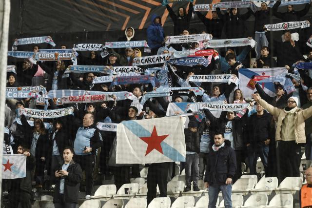 Celta Vigo's supporters hold scarves and shout slogans during the UEFA Europa League - knockout round play-off first leg - football match between PAOK FC and RC Celta de Vigo at the Toumba stadium in Thessaloniki on February 19, 2026. (Photo by SAKIS MITROLIDIS / AFP)