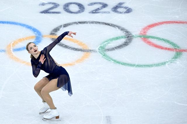 USA's Amber Glenn competes in the figure skating women's single free skating final during the Milano Cortina 2026 Winter Olympic Games at Milano Ice Skating Arena in Milan on February 19, 2026. (Photo by WANG Zhao / AFP)