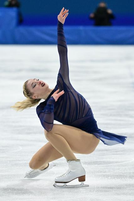 USA's Amber Glenn competes in the figure skating women's single free skating final during the Milano Cortina 2026 Winter Olympic Games at Milano Ice Skating Arena in Milan on February 19, 2026. (Photo by Piero CRUCIATTI / AFP)