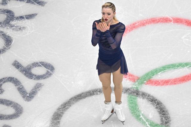 USA's Amber Glenn reacts after competing in the figure skating women's single free skating final during the Milano Cortina 2026 Winter Olympic Games at Milano Ice Skating Arena in Milan on February 19, 2026. (Photo by Antonin THUILLIER / AFP)