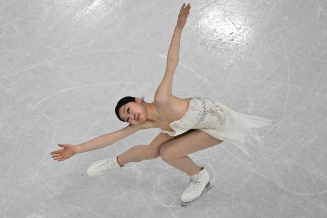 South Korea's Shin Jia competes in the figure skating women's single free skating final during the Milano Cortina 2026 Winter Olympic Games at Milano Ice Skating Arena in Milan on February 19, 2026. (Photo by Antonin THUILLIER / AFP)
