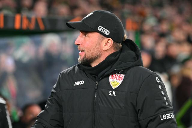 Stuttgart's German head coach Sebastian Hoeness arrives ahead of kick-off in the UEFA Europa League knockout round playoff, 1st leg football match between Celtic and Stuttgart at Celtic Park in Glasgow on February 19, 2026. (Photo by ANDY BUCHANAN / AFP)