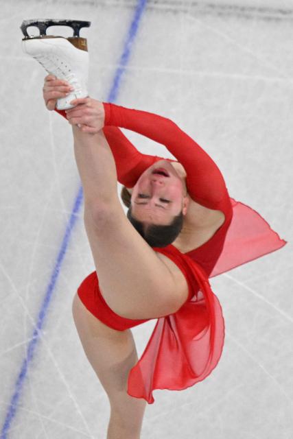 Belgium's Nina Pinzarrone competes in the figure skating women's single free skating final during the Milano Cortina 2026 Winter Olympic Games at Milano Ice Skating Arena in Milan on February 19, 2026. (Photo by Antonin THUILLIER / AFP)