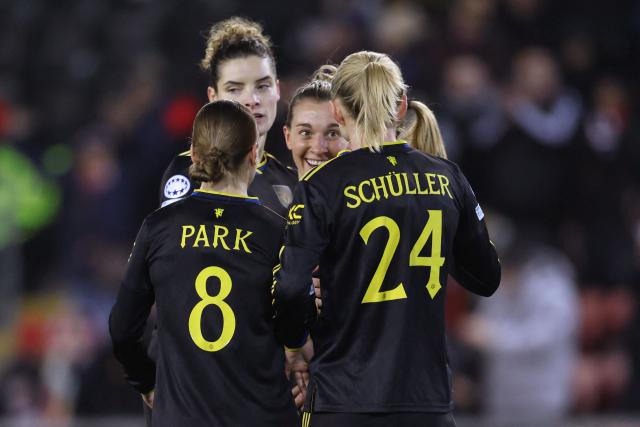 Manchester United's Swedish midfielder #18 Julia Zigiotti Olme (C) celebrates with teammates after scoring the opening goal during the UEFA Women's Champions League, knockout round playoff, 2nd leg football match between Manchester United and Atletico Madrid at the Progress With Unity Stadium in Leigh, western Manchester, on February 19, 2026. (Photo by Darren Staples / AFP)