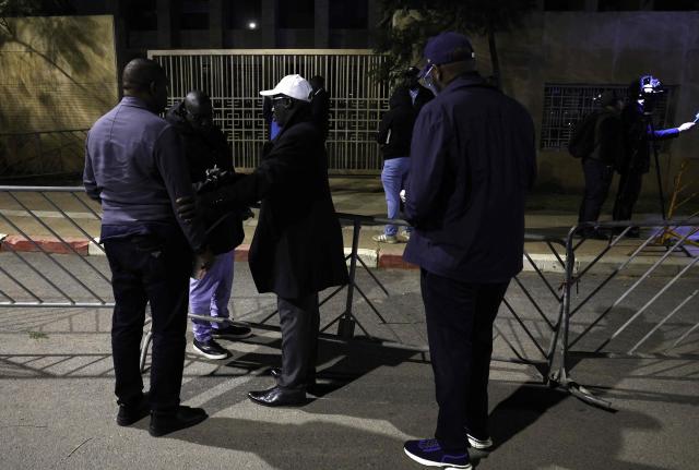 Members of the Senegalese Football Federation, relatives and representatives of the jailed Senegalese football supporters react after attending their hearing at the Court of First Instance in Rabat on February 19, 2026. A Moroccan court on February 19 sentenced 18 Senegalese football fans to prison terms ranging from three to 12 months over hooliganism charges. The group had been in pre-trial detention since January 18, the day of the heated AFCON final in which Morocco lost to Senegal 1-0 on home turf, after some Senegalese supporters attempted a pitch invasion while others threw objects onto the field. (Photo by Abdel Majid BZIOUAT / AFP)