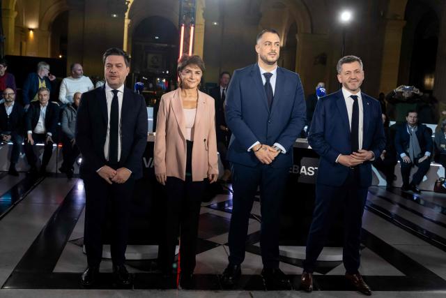 (LtoR) Marseille's incumbent mayor and candidate for re-election in France's upcoming municipal elections Benoit Payan, french right-wing Les Republicains (LR) party member Martine Vassal, president of the Bouches-du-Rhone departmental council and candidate for mayor of Marseille, french leftist party La France Insoumise (LFI) member of Parliament and mayoral candidate for the 2026 municipal elections of Marseille Sebastien Delogu and french Rassemblement National (RN)  member of Parliament and party's candidate for the mayor of Marseille, Franck Allisio pose prior a debate organized by BFM-TV and the newspaper La Provence between the main candidates for mayor of Marseille at the Palais de la Bourse in Marseille on February 19, 2026. (Photo by MIGUEL MEDINA / AFP)