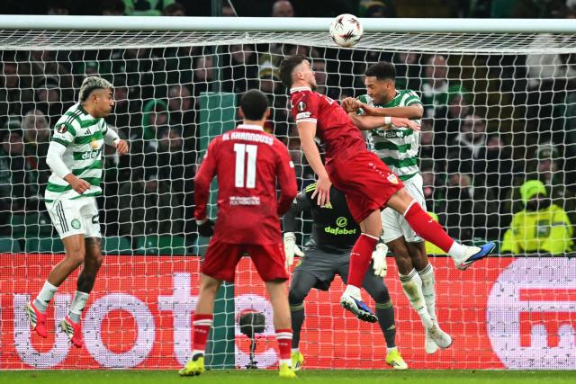 Stuttgart's Bosnian forward #09 Ermedin Demirovic (C) heads at goal during the UEFA Europa League knockout round playoff, 1st leg football match between Celtic and Stuttgart at Celtic Park in Glasgow on February 19, 2026. (Photo by ANDY BUCHANAN / AFP)