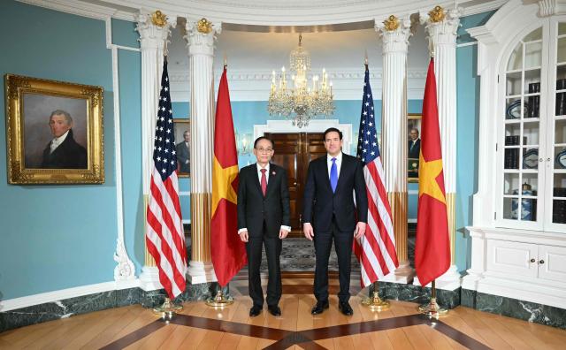 US Secretary of State Marco Rubio (R) meets with Vietnamese Foreign Minister Le Hoai Trung at the State Department in Washington, DC, on February 19, 2026. (Photo by ANDREW CABALLERO-REYNOLDS / AFP)