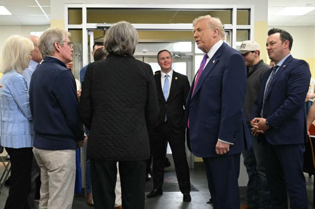 US President Donald Trump, joined by Georgia Lieutenant Governor Burt Jones (R), visits The Varsity restaurant in Rome, Georgia on February 19, 2026. (Photo by SAUL LOEB / AFP)