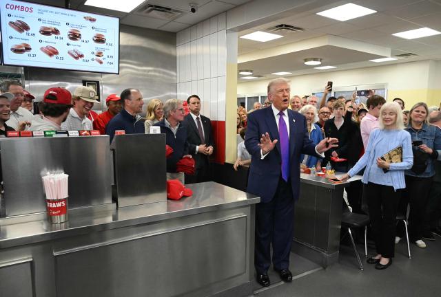 US President Donald Trump speaks during a stop at The Varsity restaurant in Rome, Georgia, on February 19, 2026. (Photo by SAUL LOEB / AFP)