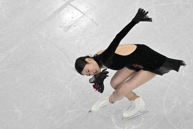 South Korea's Lee Haein competes in the figure skating women's single free skating final during the Milano Cortina 2026 Winter Olympic Games at Milano Ice Skating Arena in Milan on February 19, 2026. (Photo by Antonin THUILLIER / AFP)