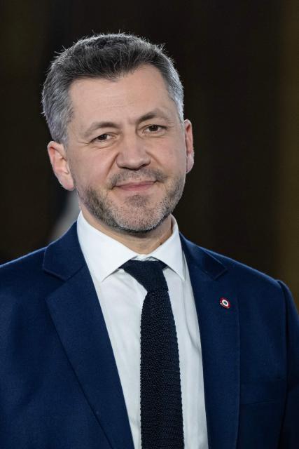 French Rassemblement National (RN) member of Parliament Franck Allisio speaks during a debate organized by BFM-TV and the newspaper La Provence between the main candidates for March 2026 mayoral election at the Palais de la Bourse in Marseille on February 19, 2026.  (Photo by MIGUEL MEDINA / AFP)
