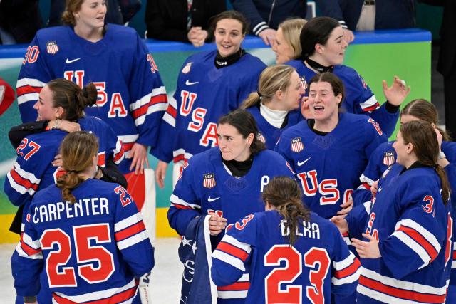USA's players react prior the medal ceremony for the women's ice hockey at the Milano Santagiulia Ice Hockey Arena during the Milano Cortina 2026 Winter Olympic Games in Milan, on February 19, 2026. (Photo by Alexander NEMENOV / AFP)