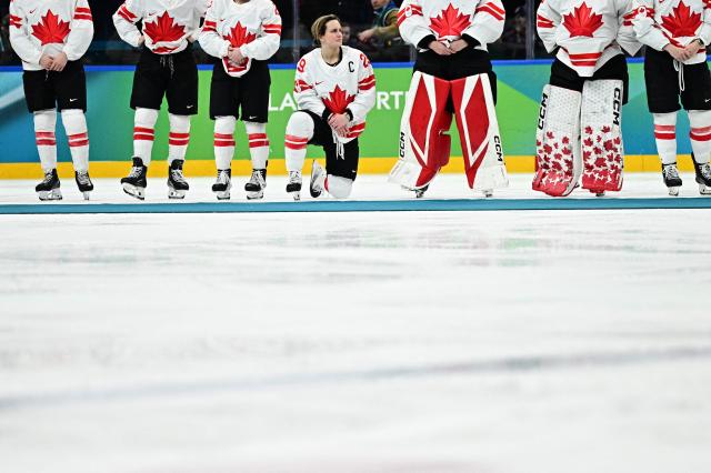Canada's #29 Marie-Philip Poulin reacts after the  women's gold medal ice hockey match between USA and Canada at the Milano Santagiulia Ice Hockey Arena during the Milano Cortina 2026 Winter Olympic Games in Milan, on February 19, 2026. (Photo by JULIEN DE ROSA / AFP)