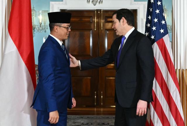 US Secretary of State Marco Rubio and Indonesian Foreign Minister Sugiono (L) meet at the State Department in Washington, DC, on February 19, 2026. (Photo by ANDREW CABALLERO-REYNOLDS / AFP)