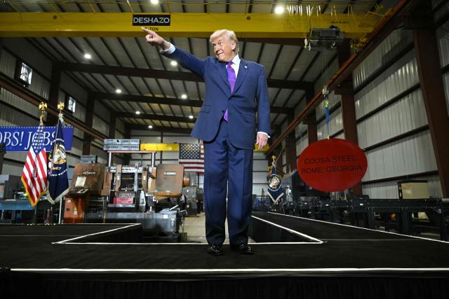 US President Donald Trump greets employees and attendees to his speach at the Coosa Steel Corporation factory in Rome, Georgia, on February 19, 2026. (Photo by SAUL LOEB / AFP)