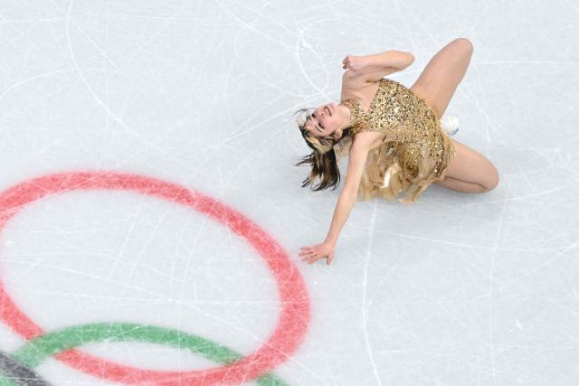 USA's Alysa Liu competes in the figure skating women's single free skating final during the Milano Cortina 2026 Winter Olympic Games at Milano Ice Skating Arena in Milan on February 19, 2026. (Photo by Antonin THUILLIER / AFP)