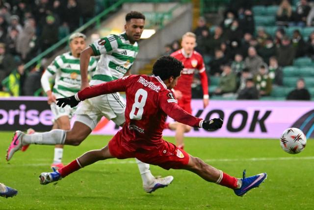 Stuttgart's Portuguese striker #08 Tiago Tomás shoots to score their fourth goal during the UEFA Europa League knockout round playoff, 1st leg football match between Celtic and Stuttgart at Celtic Park in Glasgow on February 19, 2026. (Photo by ANDY BUCHANAN / AFP)