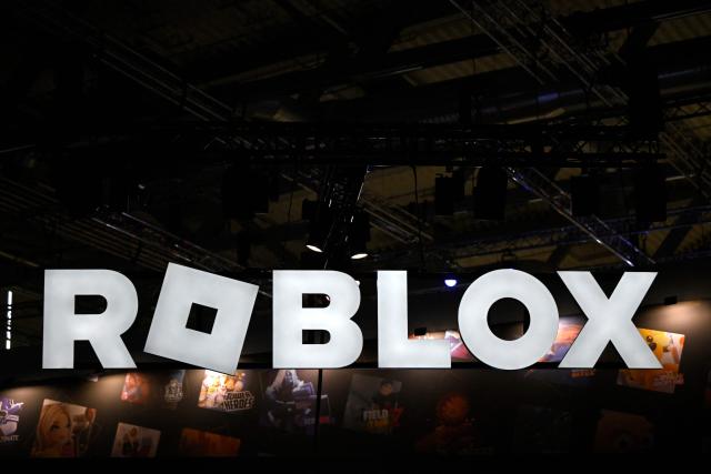 (FILES) A photo shows the logo of Roblox during the Gamescom video games trade fair at the Trade Fair Center in Cologne, western Germany, on the first day of the fair on August 20, 2025. Officials in Los Angeles County said February 19 they are suing popular online platform Roblox, alleging it exposes children to sexual content, exploitation and online predators. In a lawsuit filed in Los Angeles superior court, the county said the company does not carry out adequate moderation and its age-verification systems are not fit for purpose. (Photo by Ina FASSBENDER / AFP)