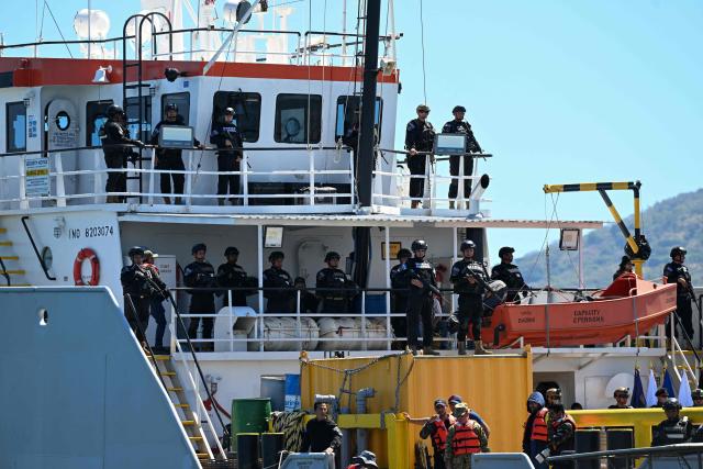 Navy officers remain aboard the vessel FMS Eagle, registered under the flag of Tanzania, from which a shipment of cocaine was seized, off the La Union Naval Base in El Salvador on February 19, 2026. El Salvador's Navy seized 6.6 tons of cocaine in Pacific waters, more than 700 kilometers off the coast of the Central American country, President Nayib Bukele said on the night of February 15, highlighting that it is the "largest seizure in the country’s history." (Photo by MARVIN RECINOS / AFP)