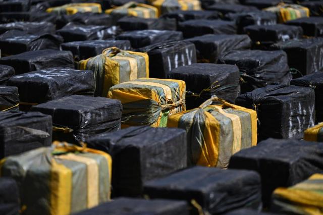 Packages of cocaine seized by Navy officers are seen aboard the vessel FMS Eagle, registered under the flag of Tanzania, off the La Union Naval Base in El Salvador on February 19, 2026. El Salvador's Navy seized 6.6 tons of cocaine in Pacific waters, more than 700 kilometers off the coast of the Central American country, President Nayib Bukele said on the night of February 15, highlighting that it is the "largest seizure in the country's history." (Photo by MARVIN RECINOS / AFP)