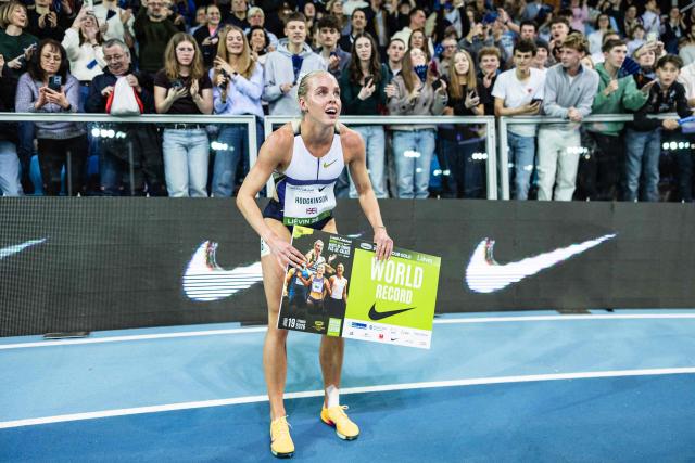 Britain's Keely Hodgkinson celebrates after breaking the world record in the 800m women final at the Athletics meeting "Hauts-de-France Pas-de-Calais" as part of the World Indoor Tour Gold, in Lievin, northern France on February 19, 2026. (Photo by Sameer Al-DOUMY / AFP)