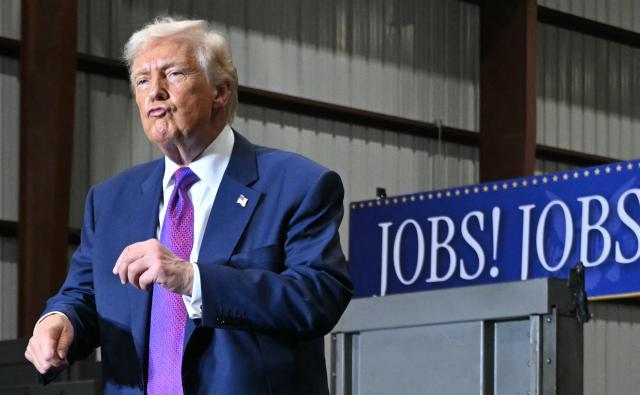 US President Donald Trump dances at the end of his speech after touring the Coosa Steel Corporation factory in Rome, Georgia, February 19, 2025. (Photo by SAUL LOEB / AFP)