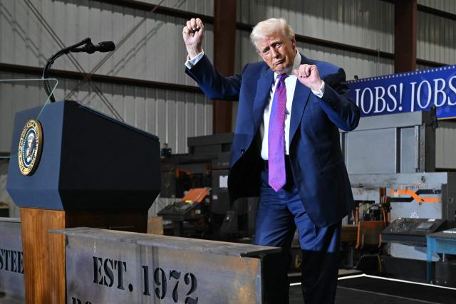 US President Donald Trump dances at the end of his speech after touring the Coosa Steel Corporation factory in Rome, Georgia, February 19, 2025. (Photo by SAUL LOEB / AFP)