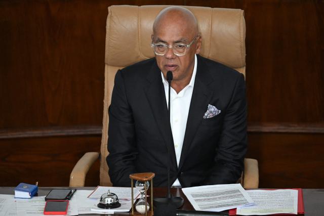 The president of Venezuela's National Assembly Jorge Rodriguez speaks during a debate on an amnesty bill proposed by Venezuela's interim president Delcy Rodriguez at the National Assembly in Caracas on February 19, 2026. Venezuela's Parliament resumed on February 19 the debate on an amnesty bill that could free hundreds of political prisoners. (Photo by Federico PARRA / AFP)