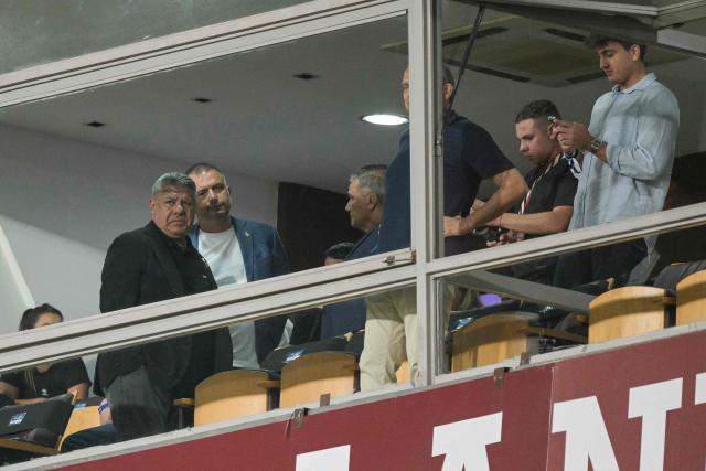 The president of the Argentine Football Association (AFA) Claudio Tapia (L) arrives to attend the Recopa Sudamericana first leg final football match between Argentina's Lanus and Brazil's Flamengo at the Ciudad de Lanus Stadium in Lanus, Buenos Aires province, on February 19, 2026. (Photo by JUAN MABROMATA / AFP)