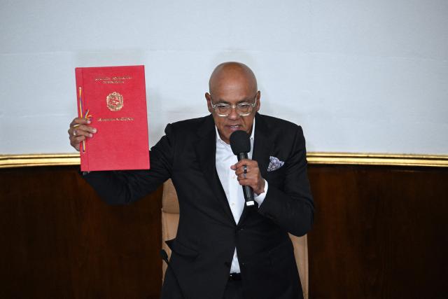 The president of Venezuela's National Assembly, Jorge Rodriguez, speaks after the approval of an amnesty law proposed by Venezuela's interim president Delcy Rodriguez at the National Assembly in Caracas on February 19, 2026. Venezuela's Parliament unanimously approved on February 19 a historic amnesty law that is expected to lead to the release of hundreds of political prisoners after 27 years of Chavismo. (Photo by Federico PARRA / AFP)