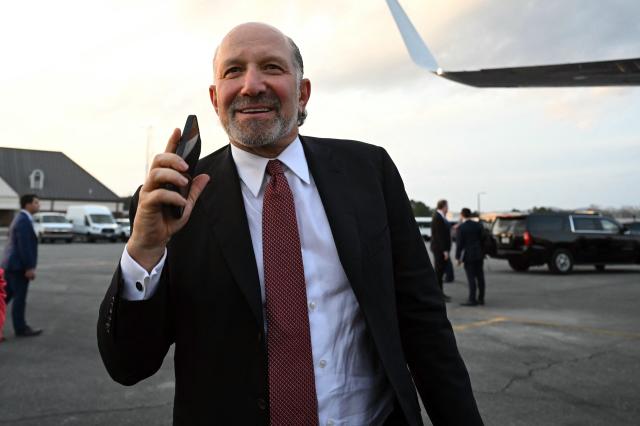 US Secretary of Commerce Howard Lutnick boards Air Force One prior to departure from Richard B. Russell Regional Airport in Rome, Georgia, February 19, 2025. Lutnick is travelling with US President Donald Trump to visit local businesses and give remarks about the economy at a steel factory in northwest Georgia. (Photo by SAUL LOEB / AFP)