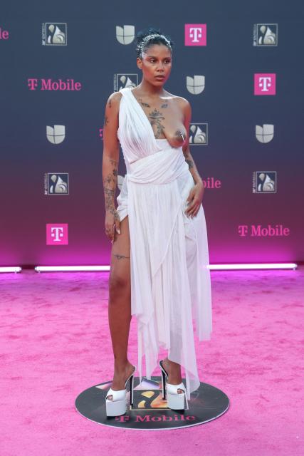 CORRECTION / Dominican rapper Tokischa attends Univision's 38th Premio Lo Nuestro at the Kaseya Center in Miami, Florida, on February 19, 2026. (Photo by Giorgio Viera / AFP) / “The erroneous mention[s] appearing in the metadata of this photo by Giorgio Viera has been modified in AFP systems in the following manner: [Dominican rapper Tokischa] instead of [Argentine singer-songwriter Maria Becerra ]. Please immediately remove the erroneous mention[s] from all your online services and delete it (them) from your servers. If you have been authorized by AFP to distribute it (them) to third parties, please ensure that the same actions are carried out by them. Failure to promptly comply with these instructions will entail liability on your part for any continued or post notification usage. Therefore we thank you very much for all your attention and prompt action. We are sorry for the inconvenience this notification may cause and remain at your disposal for any further information you may require.”