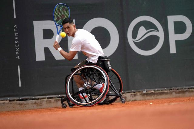 Japanese wheelchair tennis player Tokito Oda trains in the framework of the ATP 500 Rio Open tournament in Rio de Janeiro, Brazil on February 18, 2026. Japan's Tokito Oda was a nine-year-old boy who dreamed of becoming a football player when he was diagnosed with bone cancer in his left leg. A decade later, he is the world number one in wheelchair tennis. (Photo by Pablo PORCIUNCULA / AFP)