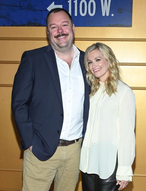 US actor Michael Gladis and US actress Beth Behrs attend the finale party of CBS sitcom "The Neighborhood" at Radford Studio Center in Los Angeles, California, on February 19, 2026. (Photo by LISA O'CONNOR / AFP)