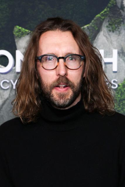 US actor Charlie Hewson attends the premiere of Apple TV's series "Monarch: Legacy of Monsters" Season 2 at the TCL Chinese Theatre in Hollywood, California, on February 19, 2026. (Photo by VALERIE MACON / AFP)