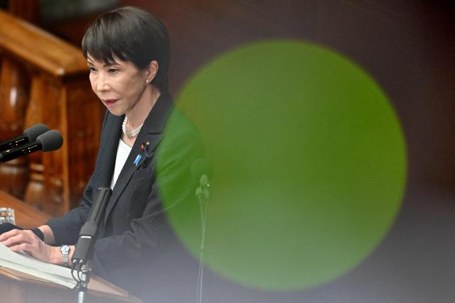 Japan's Prime Minister Sanae Takaichi delivers her policy speech during the House of Representatives plenary session in Tokyo on February 20, 2026. (Photo by Kazuhiro NOGI / AFP)