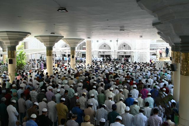 Muslim devotees offer their first Friday prayers of the Islamic holy fasting month of Ramadan, at Jama Masjid in Hyderabad on February 20, 2026. (Photo by Noah SEELAM / AFP)