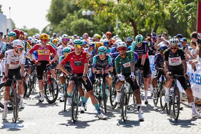 Riders wait to set off during the fifth stage of the UAE Tour cycling event from Dubai al-Mamzar Park to Hamdan Bin Mohammed Smart University in Dubai on February 20, 2026. (Photo by Fadel SENNA / AFP)