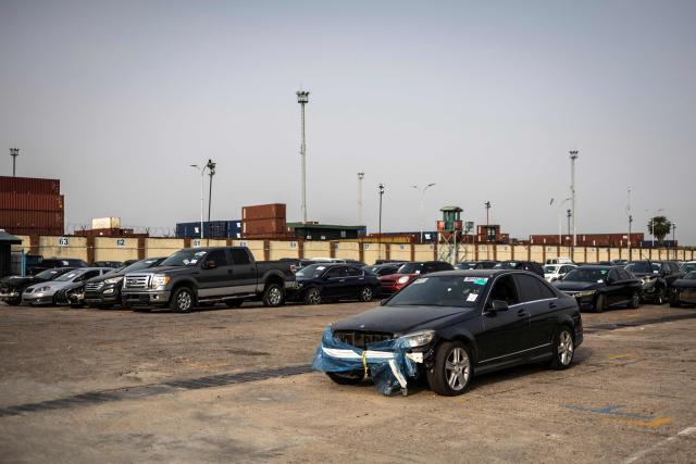 A general view of imported cars parked at the Five Star Logistics terminal in Tin Can Island Port in Lagos, on February 19, 2026. (Photo by OLYMPIA DE MAISMONT / AFP)